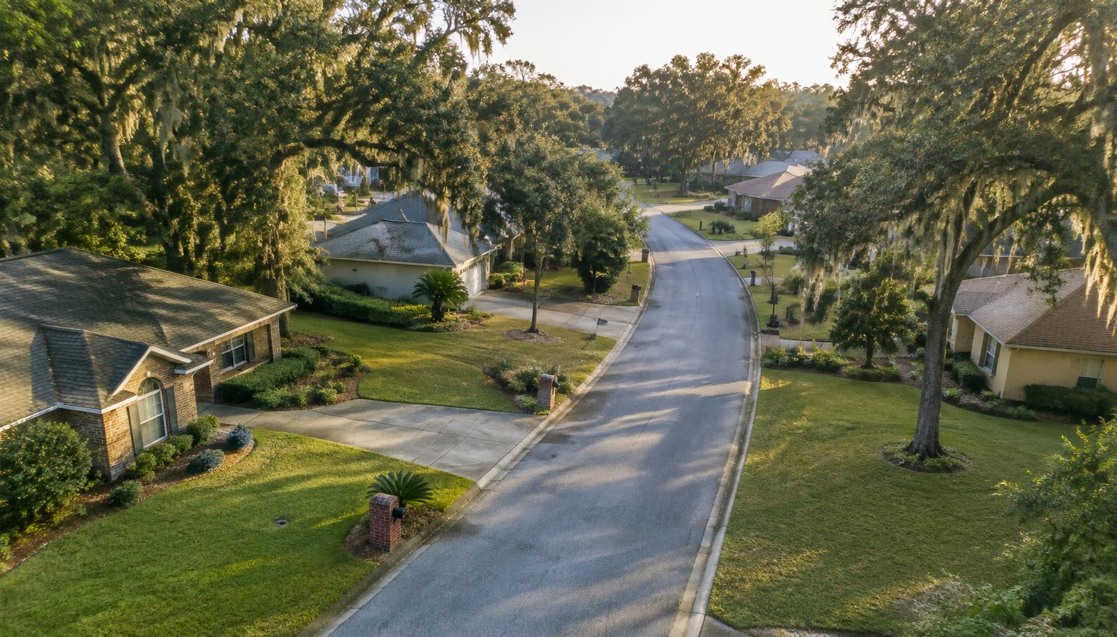 Illustrative view of a tree-lined Northwest Florida neighborhood street